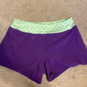 Rabbit brand, purple and green running shorts